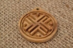 Good luck talisman made of wood and burlap